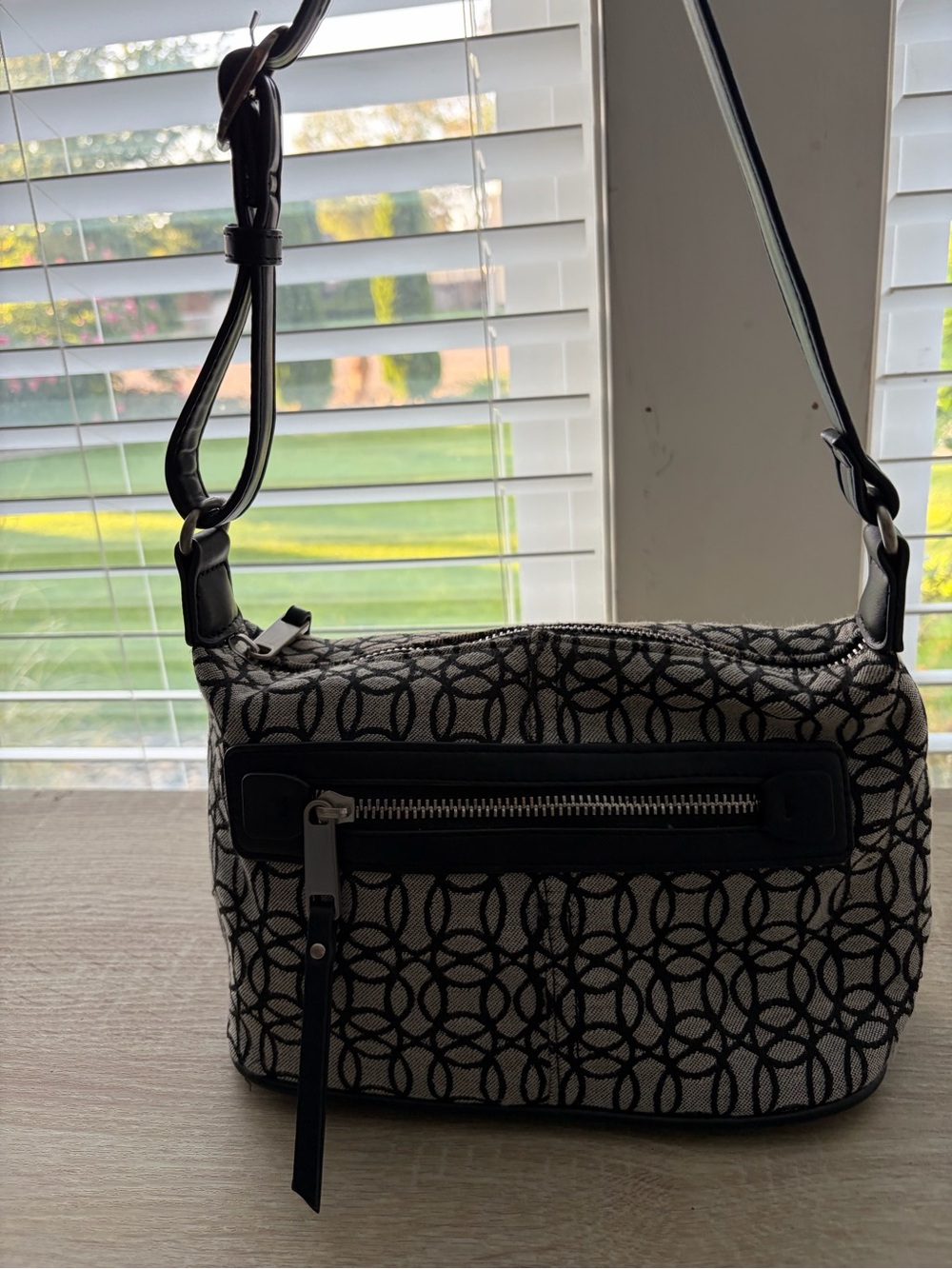 Patterned Black Crossbody Bag with Front Zip Pocket